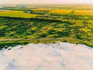 Destroy Prints: Border of desertification territory and green meadow with river is a result human destructive activity in environment