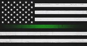 Star Shape Prints: Border patrol thin green line flag painted on a cinder block wall