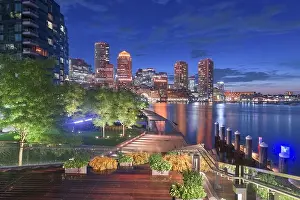 Boston, Massachusetts, USA downtown city skyline and pier at twilight