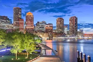 Boston, Massachusetts, USA downtown city skyline and pier at twilight
