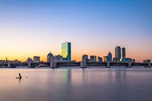 Boston, Massachusetts, USA downtown cityscape from across the Charles River at dawn