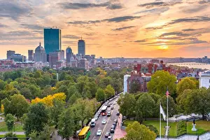 Boston, Massachusetts, USA downtown skyline over the park at dusk