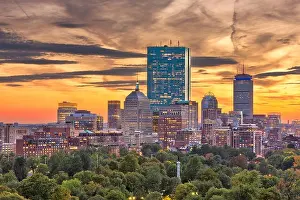 Boston, Massachusetts, USA downtown skyline over the park at dusk