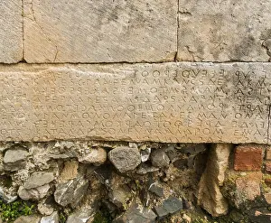 Cretan Prints: Boustrophedon inscriptions are ancient writing styles where text alternates direction in lines