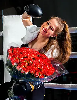 Boxer Prints: Boxing woman workout in fitness class. Boxer wearing gloves to box in ring