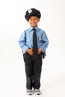 Childlike Prints: Boy Dressed as Police Officer