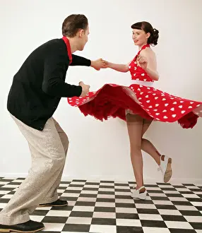 Outfits Prints: Boy and girl in 1950's clothes dancing