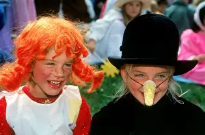 Innocent Prints: Boy and girl dressed up with painted faces on children's summer festival in Sweden Pippi Longstocking