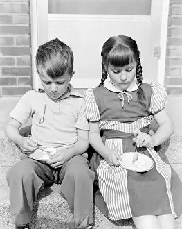 Ice Cream Prints: Boy and girl eating ice cream on porch
