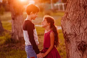 Desire Prints: boy girl teens are holding hands romance friendship love at suns