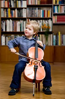 Practicing Prints: boy playing Cello