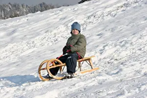 Offspring Prints: boy is sledging