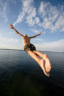 Leap Prints: Boys leaping off a pier in Denmark
