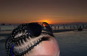 Young Girl Prints: braided hair with sunglasses during a beautiful tropical sunset