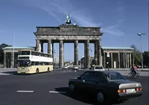 Double Decker Bus Prints: Brandenburg Gate with view from the west side to the street Unter den Linden in Berlin