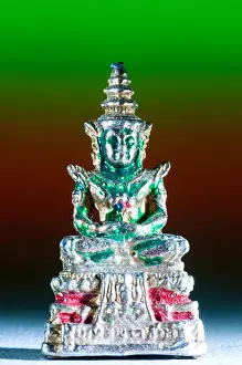 Kaew Prints: Brass amulet of Phra Kaew Morakot Buddha, from Thailand in studio setting