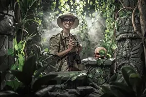 Lush Foliage Prints: Brave woman exploring the jungle and taking pictures with her camera