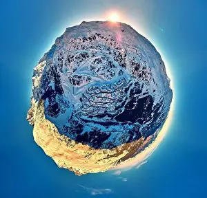 Breathtaking panoramic aerial 360 panorama little planet view on Snow Alps - winter mountain peaks around French Alps