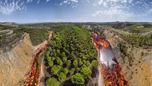 Density Prints: From above breathtaking scenery of curved river near forest cover in green trees in highlands in Minas de Riotinto