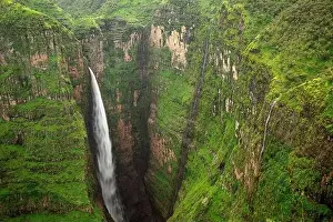 Conserve Prints: From above of breathtaking scenery of large Jinbar Waterfall with powerful stream flowing down rocky ravine