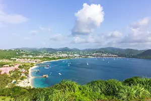 Tropical Climate Prints: A breathtaking view of the bay the beach an causeway at Gros-Islet from the top of Fort Rodney at Pigeon Island
