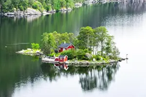 Splendid Prints: Breathtaking view of small island with red house in Lovrafjorden fjord