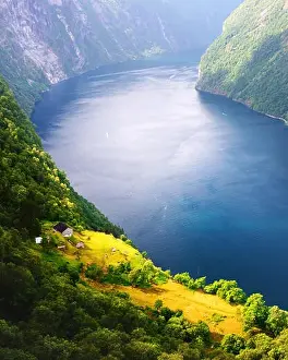 Breathtaking view of Sunnylvsfjorden fjord and famous Seven Sisters waterfalls, near Geiranger village in western Norway