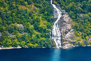 Breathtaking view of Sunnylvsfjorden fjord and famous Seven Sisters waterfalls, near Geiranger village in western Norway