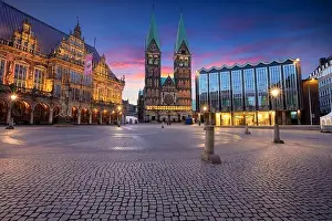 Bremen, Germany. Cityscape image of Hanseatic City of Bremen, Germany with historic Market Square, Bremen Cathedral and Town Hall at summer sunrise