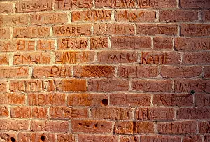 Evidence Prints: Brick Wall with Names carved into it