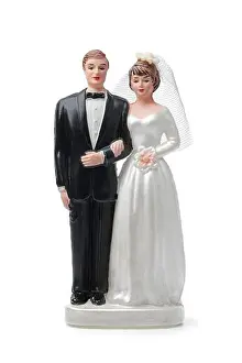 Heterosexual Prints: Bride and groom, vintage cake topper isolated on white background