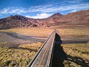 Mendoza Prints: Bridge across Mendoza River by the Andes mountains near Uspallata, Argentina