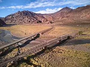Mendoza Prints: Bridge across Mendoza River by the Andes mountains near Uspallata, Argentina