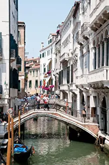 Venezia Prints: Bridges over canal Rio de la Canonica and a gondala in sunshine Venice Italy