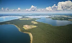 Bright colorful natural landscape with lake and forest aerial drone view