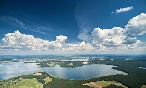 Forest Lake Prints: Bright lake landscape with blue sky and clouds aerial drone view