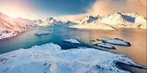 Bright morning view from flying drone of Andopen fjord with Kakernbrua bridge on background
