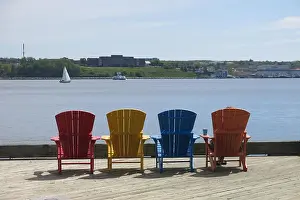 Adirondack Prints: Four brightly coloured Adirondack chairs to sit in and enjoy the view over the waterfront at Halifax