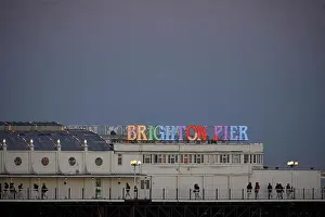 Developed Prints: Brighton Pier lit like a rainbow at night in England