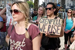 Bristol, UK, 21st June, 2017. Protesters carrying placards are pictured as they take part in a Austerity kills