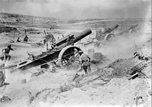 Firing Prints: British artillery guns fire towards German positions during World War One