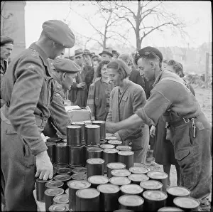 Organized Prints: British forces distribute rations to displaced German civilians on 28 March 1945 in North-West Europe