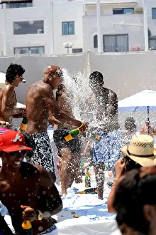 Partying Prints: British holiday makers spraying champagne all over each other at the annual Ocean Club Champagne spray party in Puerto