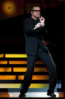 Concert Prints: British pop star George Michael performs on stage of the O2-Arena in Berlin