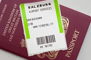 Tickets Prints: British UK passport with plane flight luggage ticket for travel abroad