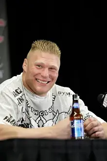 Wrestler Prints: Brock Lesnar with a Bud Light bottle at a post-fight press conference at UFC 100 at the Mandalay Bay Events Center