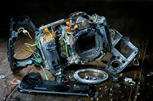 Repairing Prints: Broken digital SLR camera torn to pieces