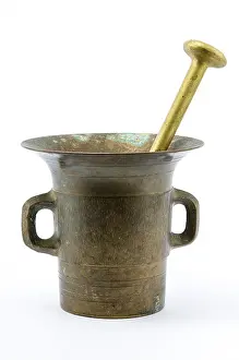 Crockery Prints: Bronze mortar on isolated white background