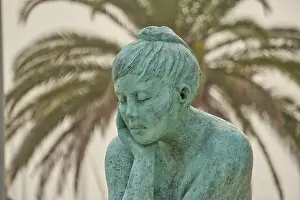 Asleep Prints: Bronze statue of a sleeping lady in Palavas-les-Flots, France