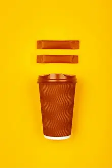 Disposable Prints: Brown paper coffee cup over yellow